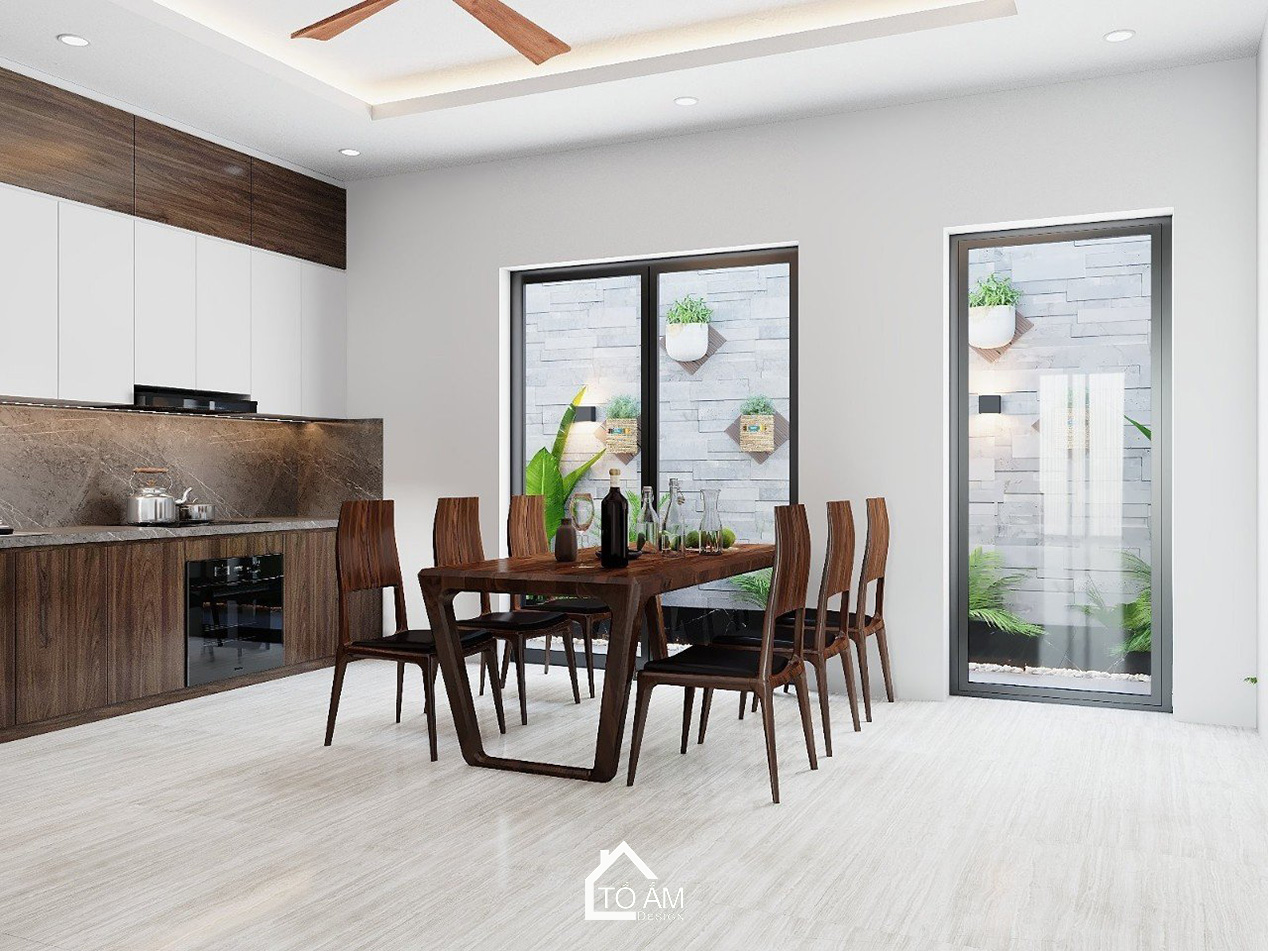 Thiết kế 3D nhà phố liền kề 3 tầng Bắc Ninh – Phòng bếp hiện đại với gỗ Óc Chó sang trọng do Tổ Ấm Design thực hiện.