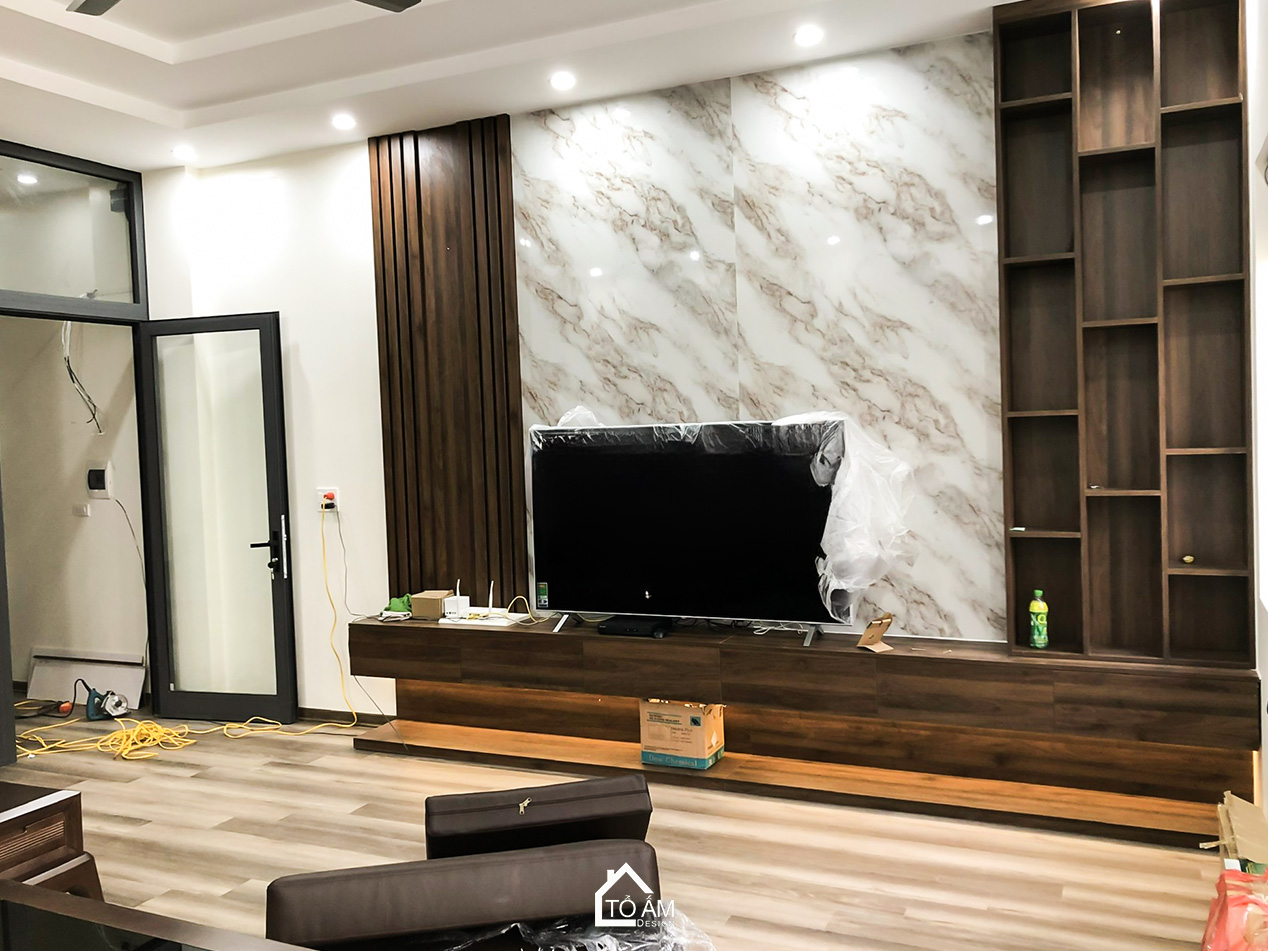 Phòng khách: Dấu ấn sang trọng của nhà phố 3 tầng chữa lành - Hoàn thiện nhà phố 3 tầng chữa lành tại Bắc Ninh - Tổ Ấm Design