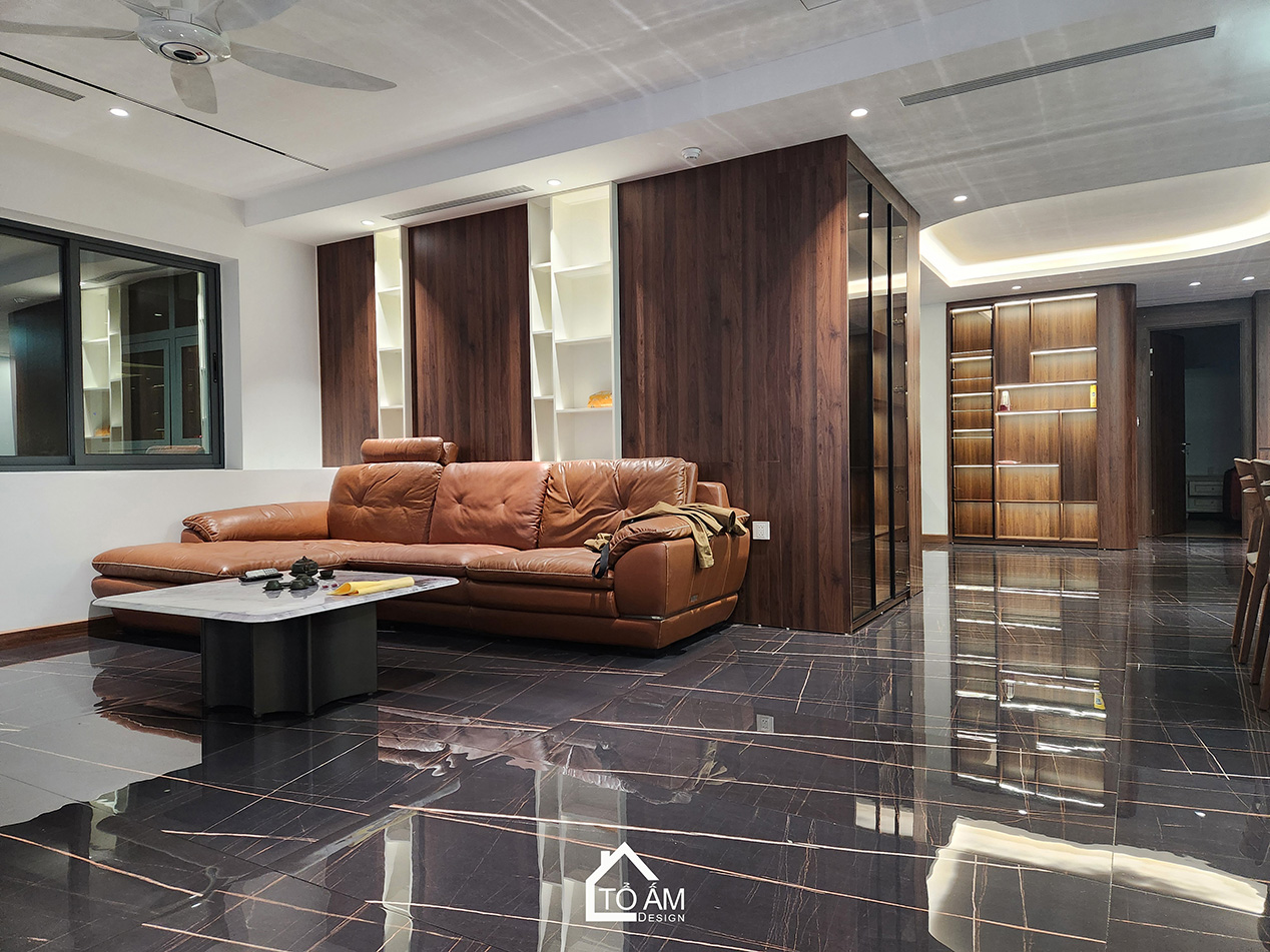 Phòng khách: Sự đối lập tinh tế tạo nên chiều sâu sang trọng - Hoàn thiện Chung cư 2 ngủ tại Tòa Ciputra, Tây Hồ - Tổ Ấm Design 