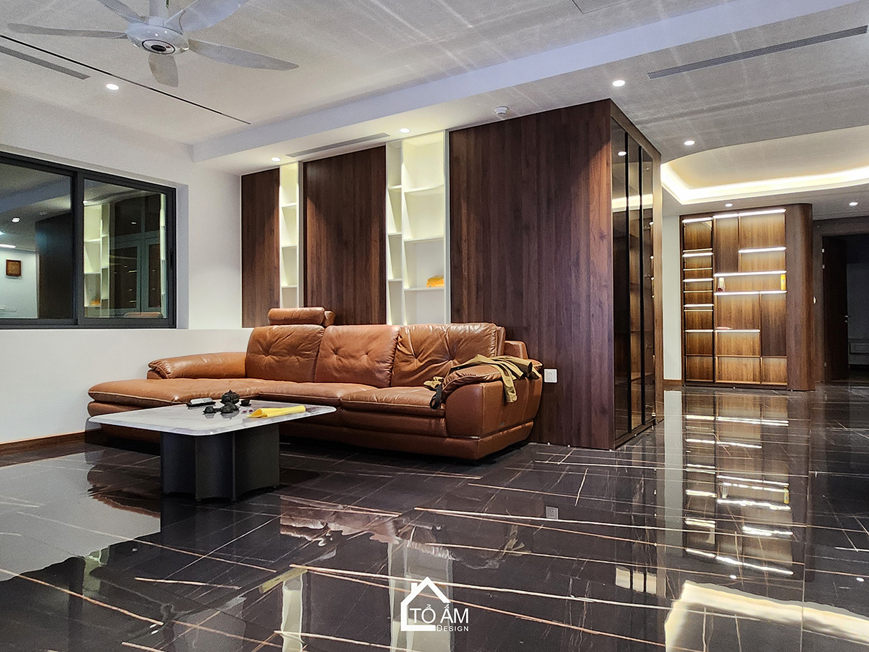 Phòng khách: Sự đối lập tinh tế tạo nên chiều sâu sang trọng - Hoàn thiện Chung cư 2 ngủ tại Tòa Ciputra, Tây Hồ - Tổ Ấm Design 