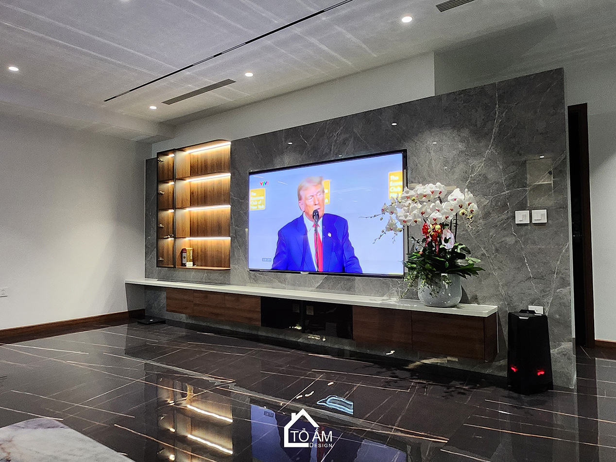 Phòng khách: Sự đối lập tinh tế tạo nên chiều sâu sang trọng - Hoàn thiện Chung cư 2 ngủ tại Tòa Ciputra, Tây Hồ - Tổ Ấm Design 