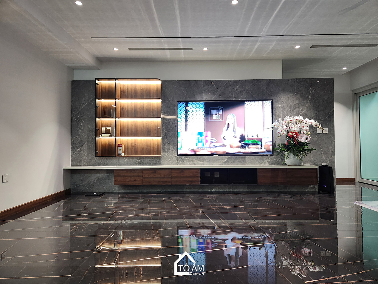 Phòng khách: Sự đối lập tinh tế tạo nên chiều sâu sang trọng - Hoàn thiện Chung cư 2 ngủ tại Tòa Ciputra, Tây Hồ - Tổ Ấm Design 