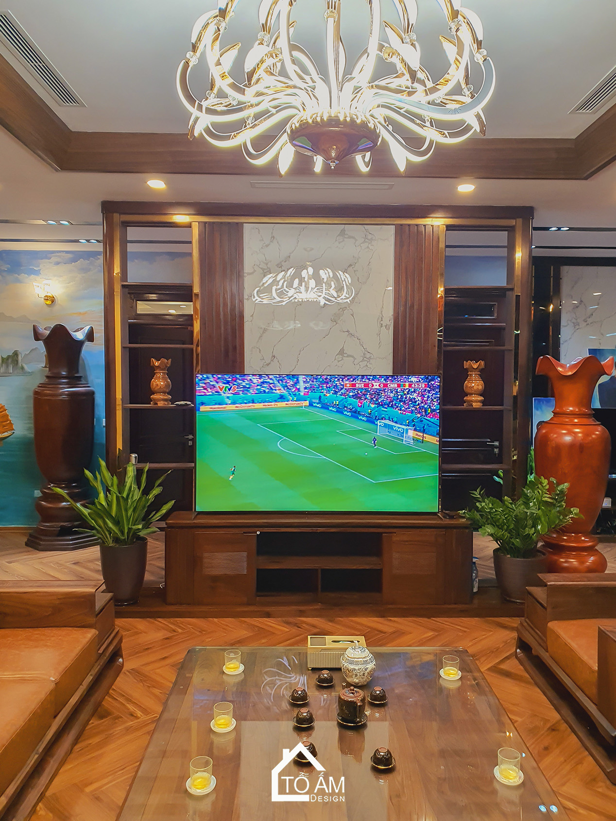 Phòng khách Penthouse Gỗ Tự Nhiên, Gỗ óc chó Sang Trọng - Hoàn thiện công trình Penthouse Gỗ Tự Nhiên chú Vui tại Hòa Lạc - Tổ Ấm Design