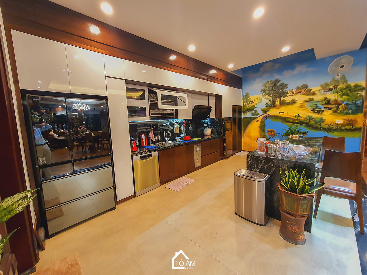 Phòng bếp Penthouse Gỗ Tự Nhiên, Gỗ óc chó Sang Trọng - Hoàn thiện công trình Penthouse Gỗ Tự Nhiên chú Vui tại Hòa Lạc - Tổ Ấm Design